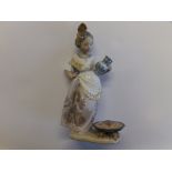 A Lladro Spanish girl figurine.