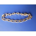 A yellow metal bracelet