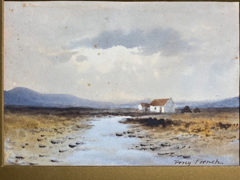 Percy French (1854-1920) - watercolour - Bogland view with cottage and turf stacks, signed 6.5" x