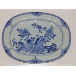 A 19thC Chinese blue & white serving dish decorated with exotic birds, 16".