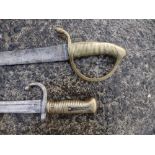 A 19thC brass-hilted sword and a French bayonet. (2)