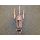 An African Dogon mask, 18" high,