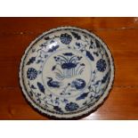 A 20thC Chinese porcelain circular dish in the antique style.