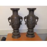 A large pair of late 19th/early 20thC Japanese bronze vases - one slightly damaged.