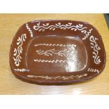 Two old slipware rectangular 'baking' dishes.