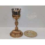 A parcel gilt Continental white metal Communion cup, decorated with neoclassical floral swags, on