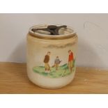 A Carlton Ware golfing tobacco jar circa 1910 - 'Far & Sure'.