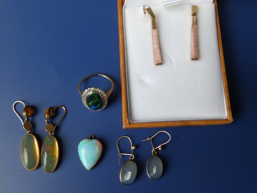 A heart shaped opal pendant, a cluster ring and three pairs of drop earrings. (8)
