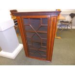 A 20thC reproduction style inlaid mahogany corner cupboard, Width 26.5".