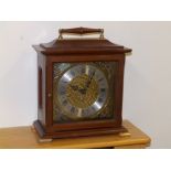 A Westminster chiming mantel clock.