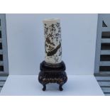 A Japanese Meiji period shibayama inlaid ivory tusk vase decorated in gold lacquer, mother-of-