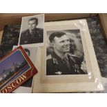 A collection of USSR photographs including cosmonauts and related items.