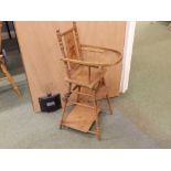 An early 20thC metamorphic child's high chair.
