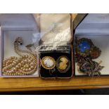 A bar brooch , costume brooches and other jewellery.