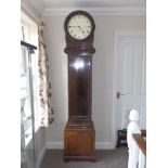An early 20thC mahogany chiming longcase clock retailed by Maple & Co. Ltd. In the Regency style,