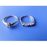 A small diamond solitaire and a 9ct sapphire & diamond five stone ring. (2)