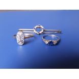 An art deco style rose cut diamond ring, a small sapphire & diamond three stone ring and a