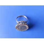 A George V half sovereign ring.