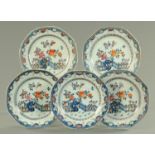 Five Chinese Famille Rose plates, circa 1770, of octagonal shape, decorated with tree peony,