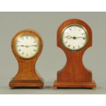 An Edwardian mahogany cased balloon clock, with single-train movement and Roman numerals,