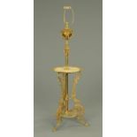 A cast brass telescopic standard lamp,
