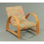 A child's Art Deco armchair, circa 1920's, with fixed curved seat and curved arm rests,