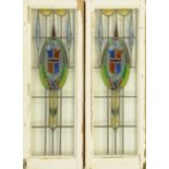 Two leaded and stained glass window panels. Each 92 cm x 30 cm.