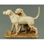 A white painted cast iron Labrador group, length 94 cm, height 78 cm.