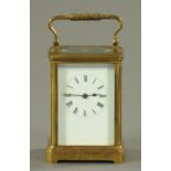 A large French brass carriage clock, timepiece only. Height 13.5 cm.
