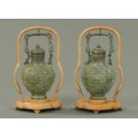 A pair of Chinese archaic style bronze ritual vessels and covers, 20th century,