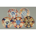 Five Japanese Imari scalloped plates, late Meiji/early Taisho, in typical Imari colours, 21.