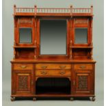 An Edwardian walnut mirror backed sideboard, the upper section with spindled galleries,