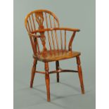 A William Wheatland attributed yew wood and elm Windsor chair, with splat back,