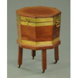 A George III mahogany brass bound octagonal cellarette,