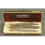 A Sheaffer White Spot vintage pen and pencil set, sterling silver with original box.