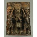 A Benin bronze plaque, depicting three warriors. 30 cm x 21 cm.