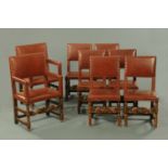 A set of two carver arm and six single oak dining chairs,