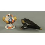 A Vienna pottery ocarina, in painted terracotta, bearing plaque,