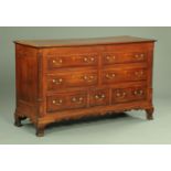 A George III mahogany Lancashire mule chest, the front modelled as a series of drawers,