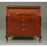 A mahogany cylinder bureau, Continental, with sliding green tooled leather writing surface,
