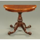 A Victorian walnut demi-lune turnover top card table,