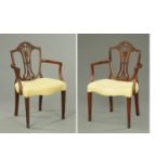 A pair of George III mahogany armchairs, each with arched back, pierced splat,