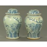 A pair of Chinese blue and white Meiping and covers, 20th century, decorated with Kylin.