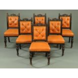 A set of six late Victorian oak dining chairs, with deep buttoned backs,