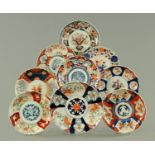 Nine Japanese Imari plates, 19th century, decorated in typical Imari colours,