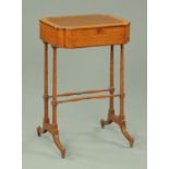 A Regency mahogany satinwood banded worktable, with lift up top,