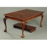 A mahogany dining table, circa 1930, with moulded edge,