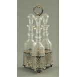 A silver plated three bottle decanter stand, 19th century,