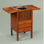 A George III mahogany washstand, with fold over top,