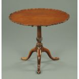 A George III mahogany tripod table, with piecrust edge, snap action,